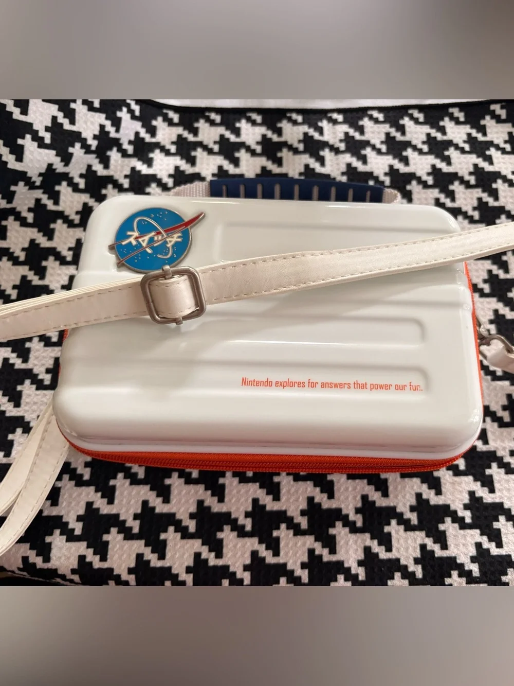 Nintendo White Portable Game Case with Blue Handle and Orange Trim